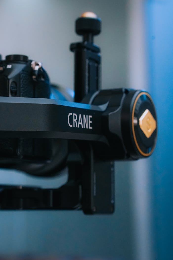 our-journey-01 Close-up of a camera mounted on a Crane gimbal for stabilization.