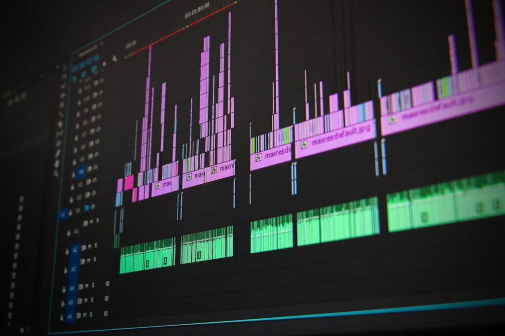 pexels photo 257904 Close-up of a professional audio and video editing software interface with waveform displays.
